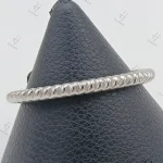 دستبند طلاي النگويي طرح بنگل پيچ سه رنگ سفيد