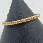 دستبند طلاي النگويي طرح بنگل پيچ سه رنگ زرد