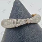 دستبند النگويي طلاي سفيد نگين دار فنري