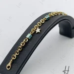 دستبند زنجيري اويز دار ميناكاري جتاش