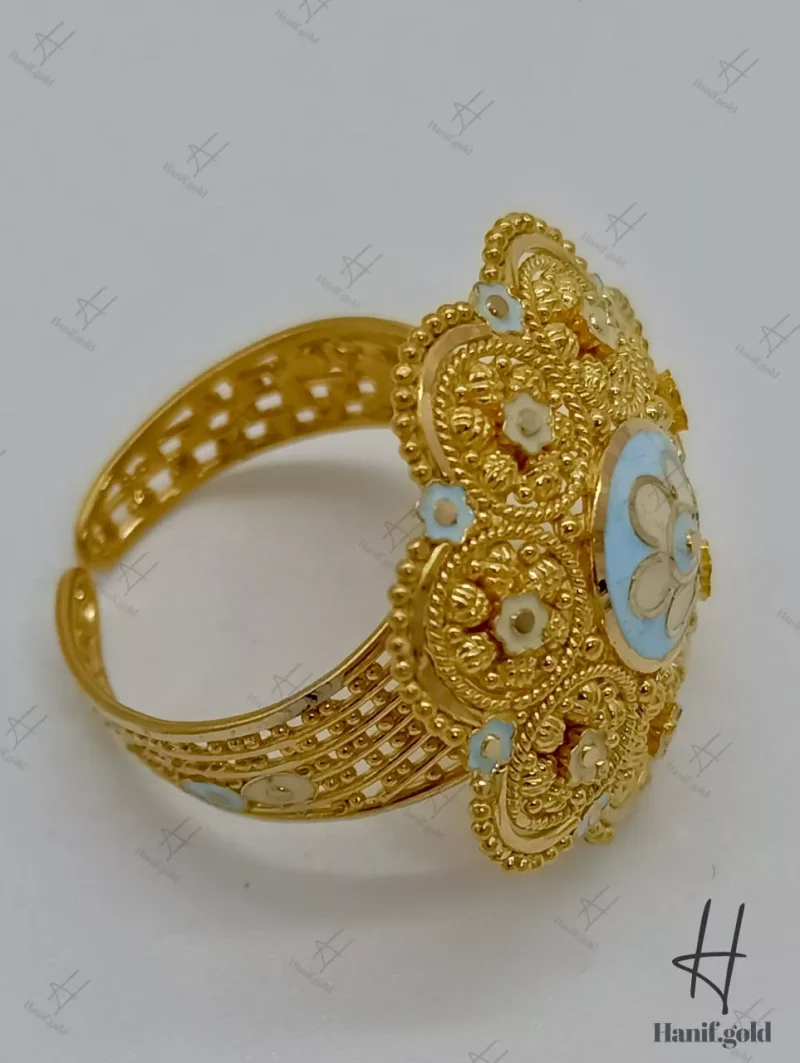 انگشتر کار جور ۲۱ عیار دوبی ، طرح گل ، میناخور آبی آسمانی