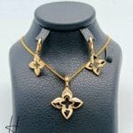 نیم ست طلای زنانه ، گل چهار ، پر آینه ای زرد ( اکسترا )