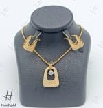 نیم ست طلای زنانه ، مدال گوشواره طلای زرد مات طرح LV ، مدال تک نگین اتمی ( مجموعه پرل )