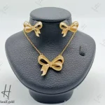 نیم ست طلای زنانه ، گردنی گوشواره زرد نگین دار اتمی ( پاپیون )