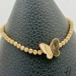 دستبند طلای کشی،گوی و پروانه (دستبند نرمال)