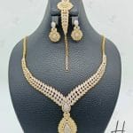 سرویس طلای زرد جناقی طرح بته جقه و اشک ،نگین دار (سرویس پریزما)