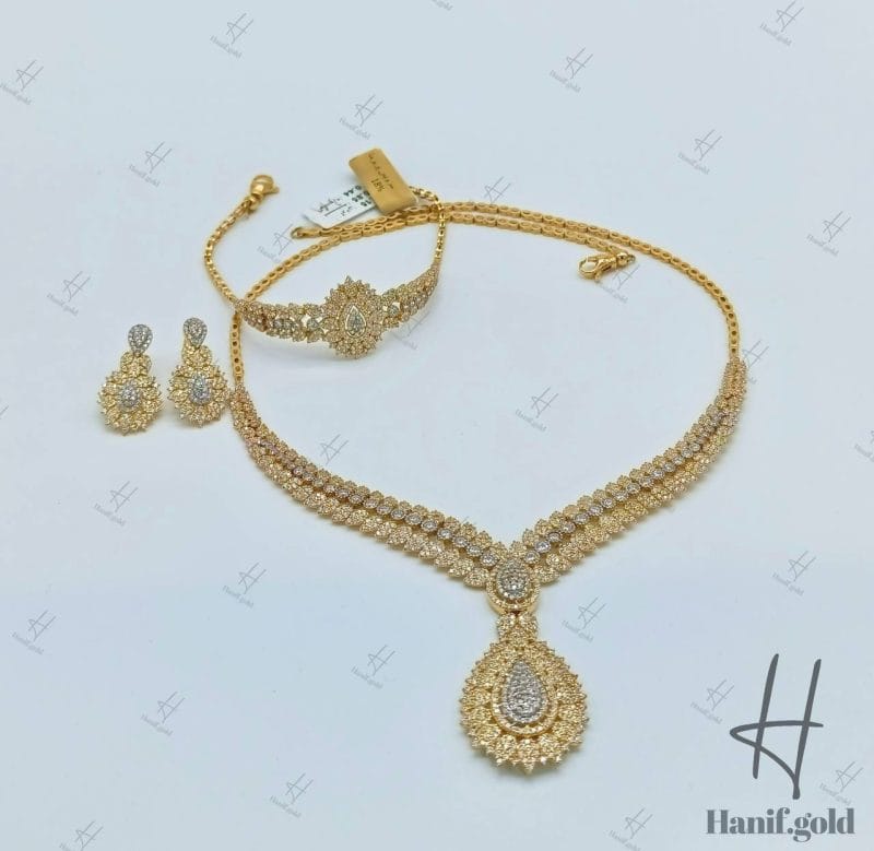 سرویس طلای زرد جناقی طرح بته جقه و اشک ،نگین دار (سرویس پریزما)