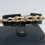 دستبند طلای النگویی رز‌گلد آیینه‌ای نگین دار ، طرح استخوانی