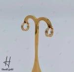 گوشواره طلای دو رنگ سفید و زرد حلقه‌ای جلوا