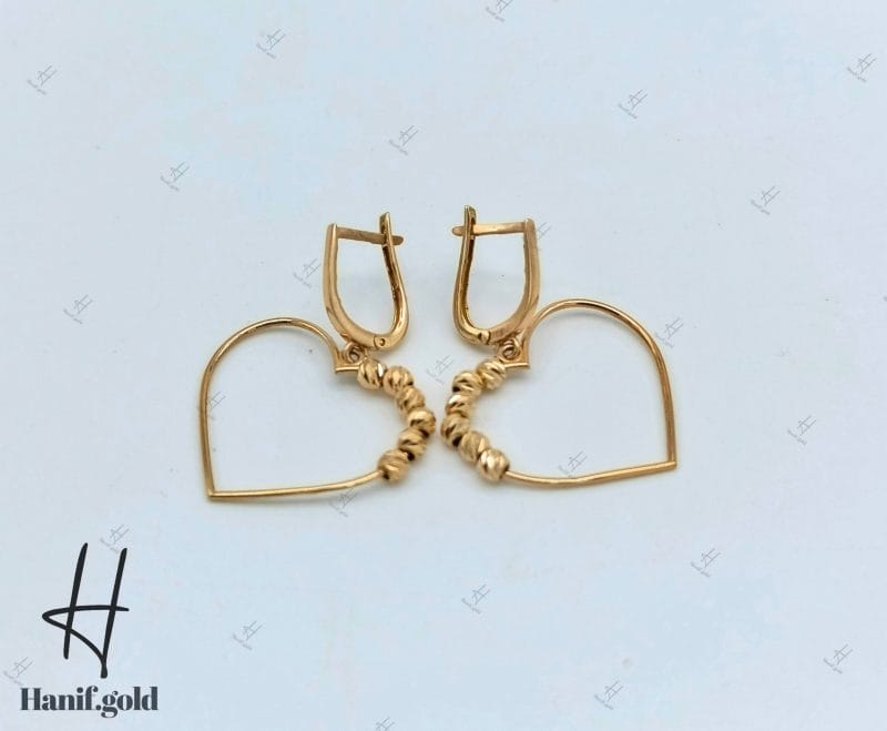 گوشواره طلای زرد آیینه‌ای با طرح قلب و توپ تراش (گوشواره ذهبی) - Image 2