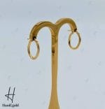 گوشواره طلای حلقه‌ای سبک با طرح پیچ