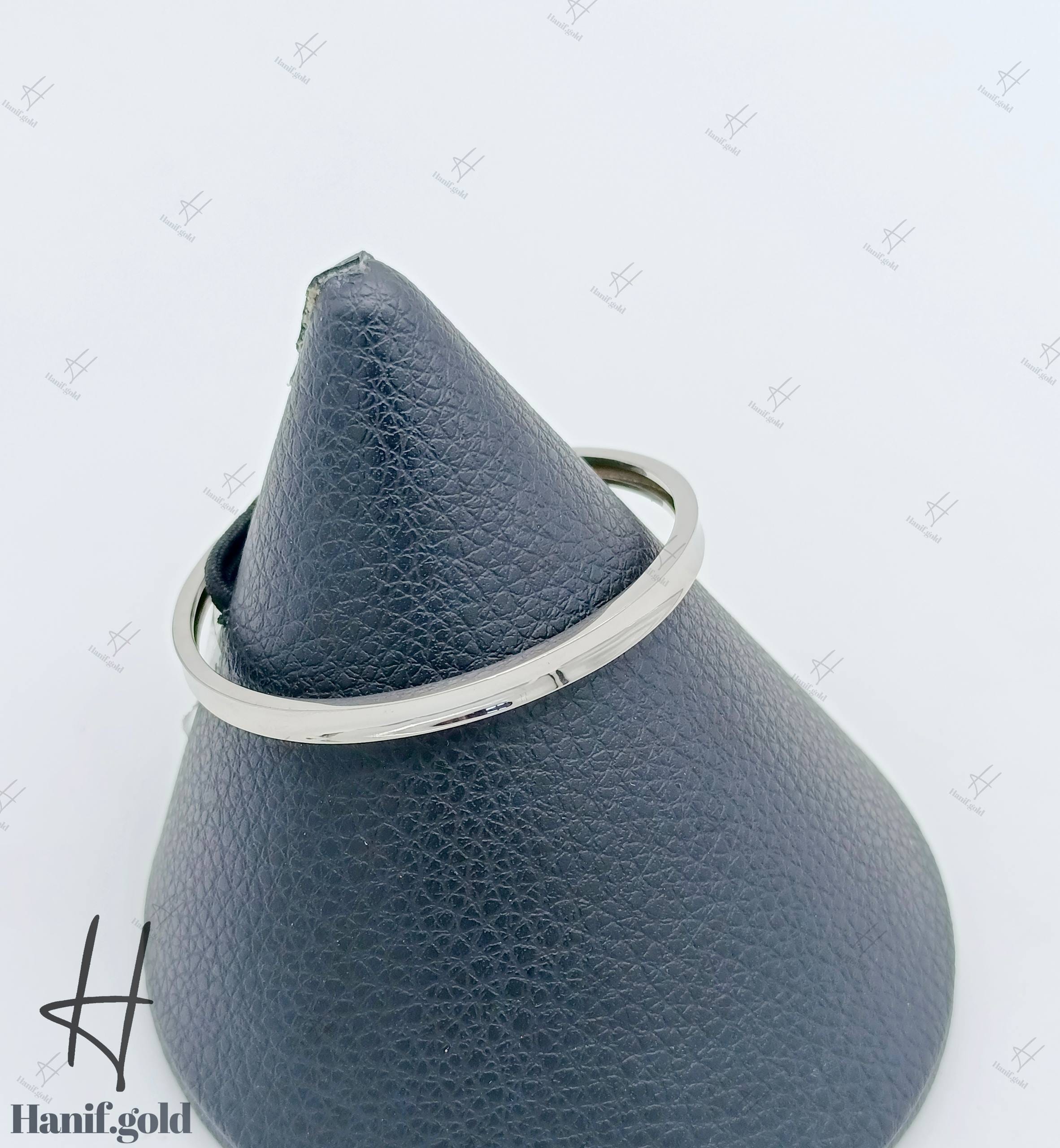 photo_۲۰۲۵-۰۹-۱۷_۱۸-۵۱-۱۳ دستبند النگویی طلای سفید،بنگل ساده (بنگل آدرین) - Image 1