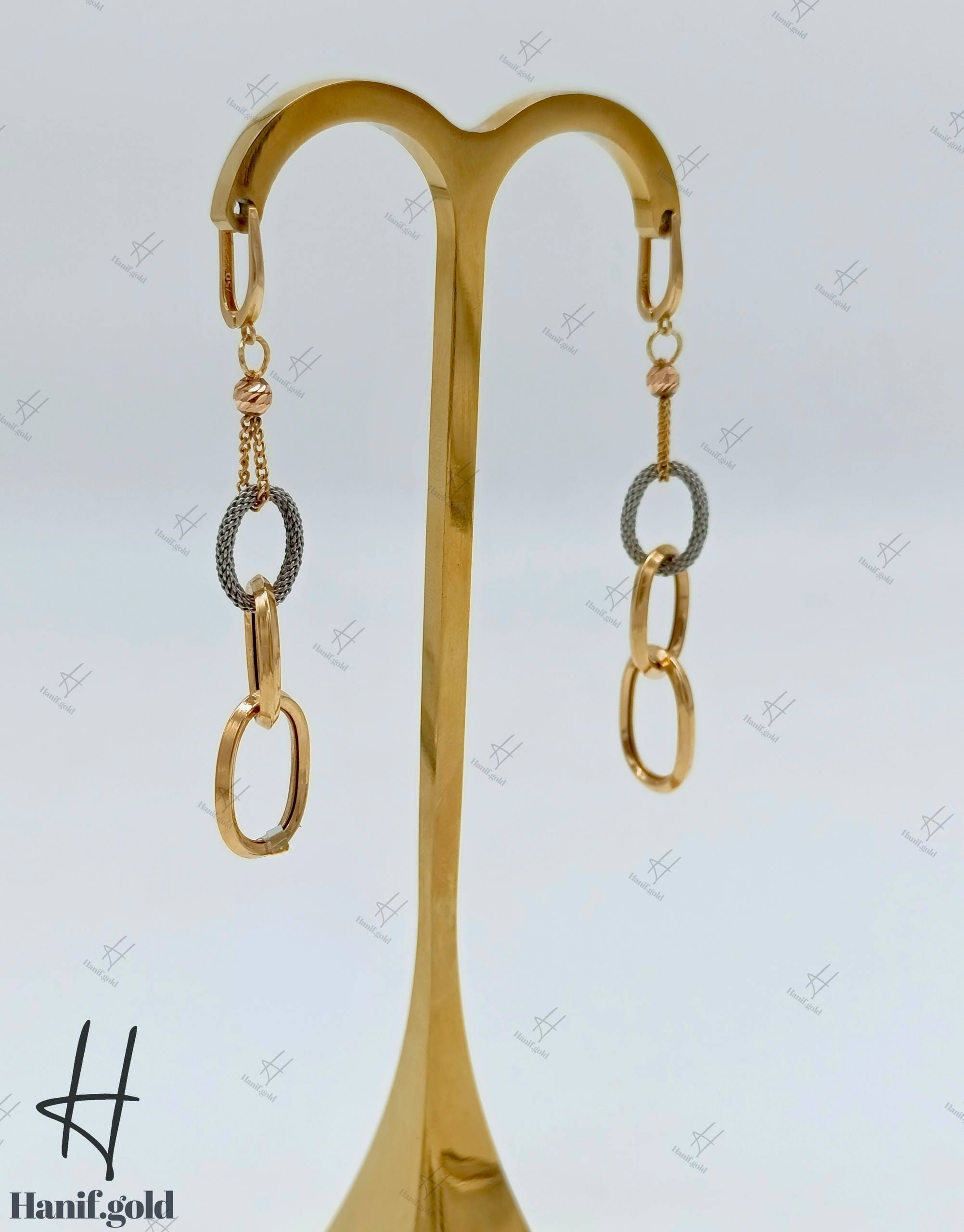 photo_۲۰۲۵-۰۹-۱۸_۰۹-۵۹-۱۲ گوشواره طلای آویز سه حلقه با توپ تراش و زنجیر فرد(گوشواره فرد) - Image 1