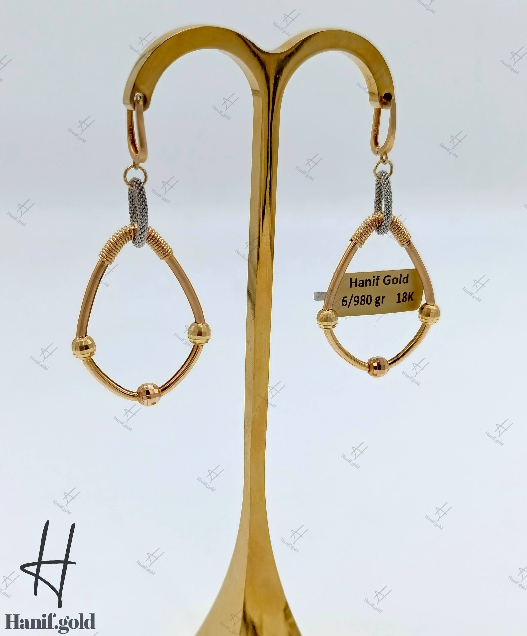 photo_۲۰۲۵-۰۹-۱۸_۱۰-۰۴-۴۴ گوشواره طلای آویز با توپ تراش و زنجیر فرد طرح اشک (گوشواره فرد) - Image 1