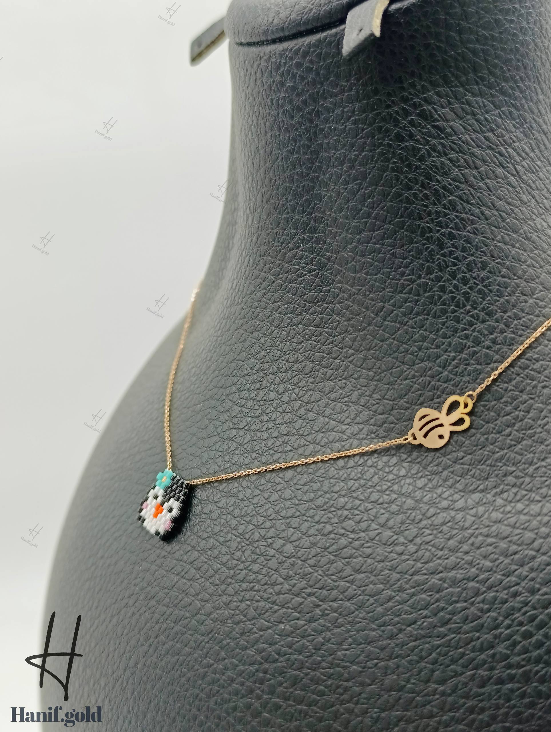 photo_2025-10-09_11-36-27 گردنی طلای بافت مینیاتوری طرح پنگوئن - Image 1