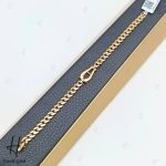 دستبند طلای لخت زرد آیینه‌ای کارتیه فیوژن با طرح امگا