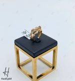 انگشتر طلای دو رنگ زرد و‌سفید تراش طرح پاپیون (سرو تراش)