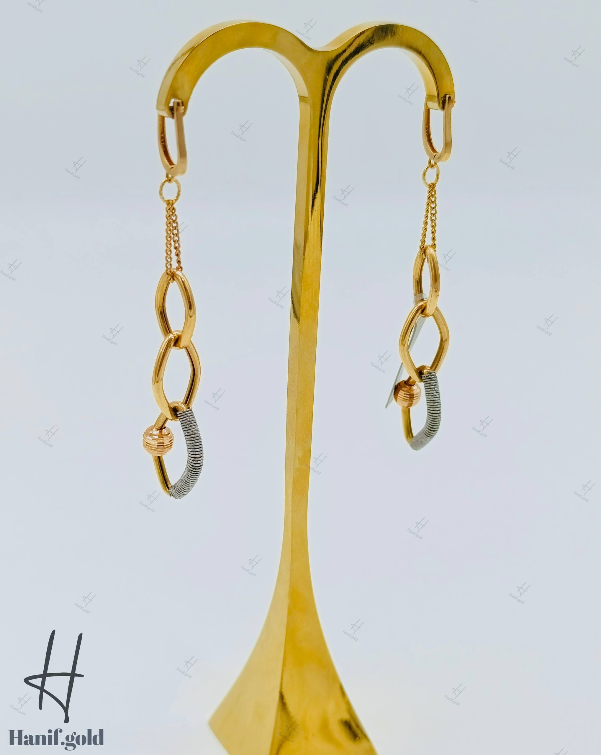 photo_۲۰۲۵-۱۰-۰۲_۱۱-۳۹-۳۳ گوشواره طلای آویز سه حلقه،با توپ تراش و زنجیر فرد (گوشواره فرد) - Image 1